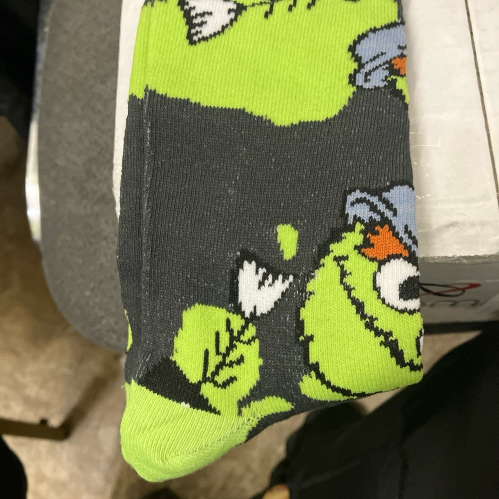 Green and Black Bird-Themed Pet Socks